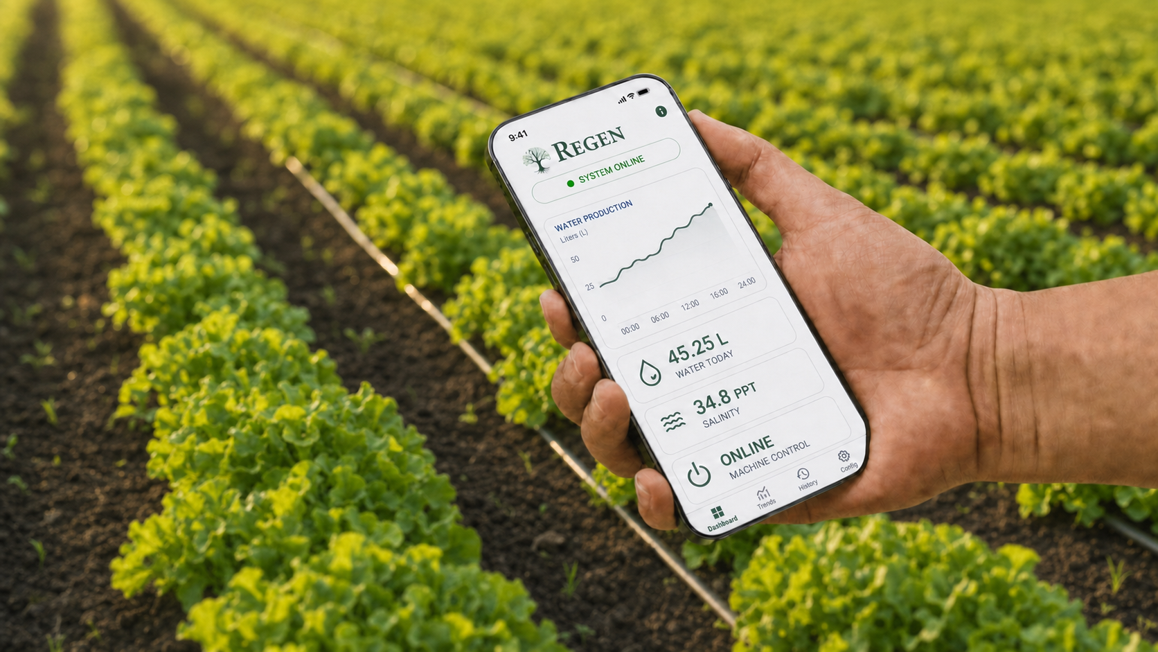 The ReGen app dashboard on a phone held in front of fresh green lettuce